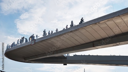 Photography People enjoying the panoramic views from the V-shaped floating bridge in Zaryady
