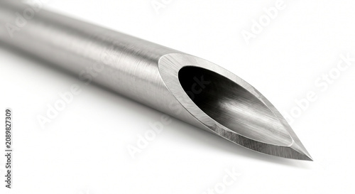 Extreme macro of a heavy-duty veterinary hypodermic needle tip. Stainless steel medical hardware isolated on a pure white background.