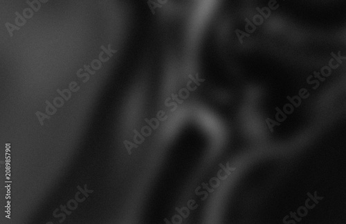 Photos Abstract blurred human silhouette against dark background