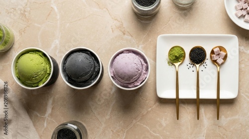 A beautiful assortment of artisan ice cream featuring unique flavors and toppings arranged on a stunning marble surface