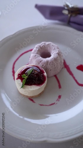 Raspberry Cheesecake with Ice Cream on Elegant Table