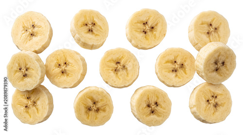 Schilderij op canvas Many fresh ripe banana slices neatly arranged creating a healthy and nutritious food pattern