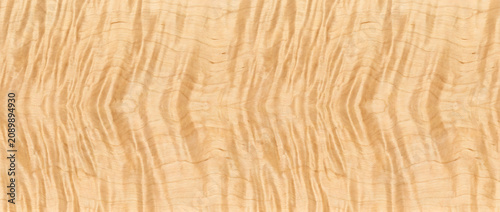 Foto Wood Texture featuring a seamless curly maple inspired grain surface with realis