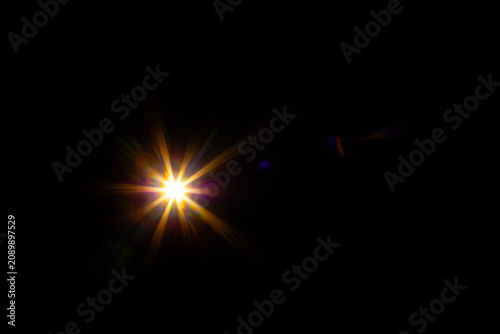 Sun flare on the black background