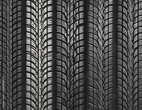 A close-up of multiple tire treads with a repeating pattern