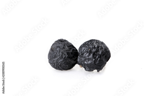 Dried Black Wolfberries from Qinghai China Studio Still Life Food Photography on White Background