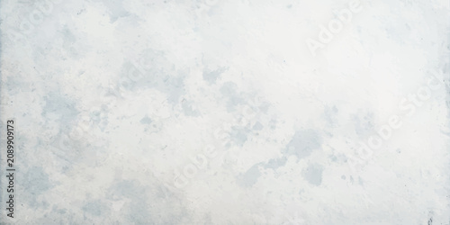 Fotografie Abstract texture resembling a watercolor wash with soft, blended hues of white and pale blue, creating a gentle, atmospheric background