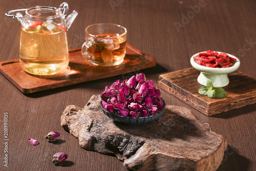 Принти на полотні Traditional Chinese Rose Tea Ceremony with Dried Flowers and Glass Teapot - Yunn