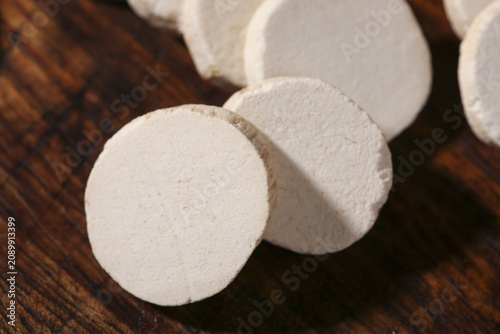 Fresh Chinese Yam Slices on Wood - Traditional Asian Cooking Ingredient Studio Shot