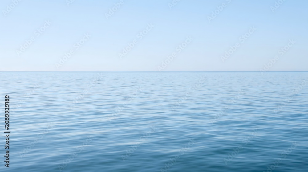 Naklejka premium Serene ocean view with calm waters and clear blue sky