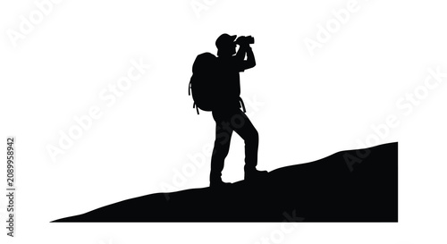 Tableau sur toile Hiker with backpack viewing through binoculars on a hilltop black silhouette mou
