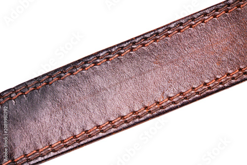 Slika na platnu Leather belt against transparent background, modern sneakers, dark brown leather