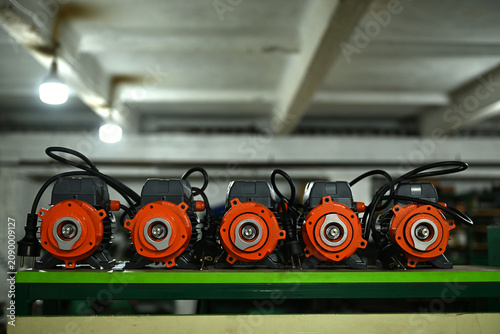 Принти на полотні Production electric motors are standing in a row in the production room of the w