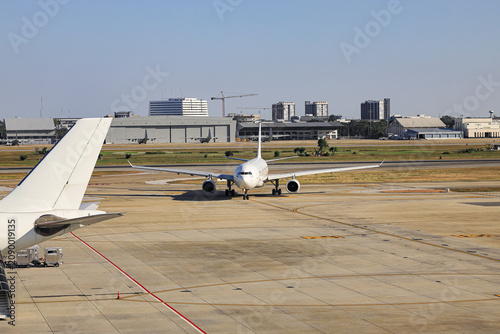 Airport view, the plane followed the taxiway to the runway. to prepare for departure.