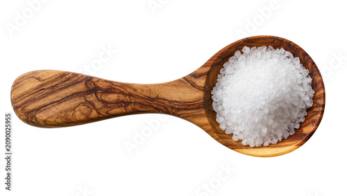 Tableau sur toile Isolated wooden spoon filled with coarse sea salt crystals for cooking and seaso