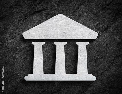 Court building tribunal symbol carved on stone wall
