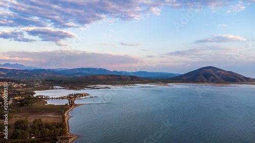 Photography Aerial view of Sagiada lagoon and gulf in Greece at sunset light