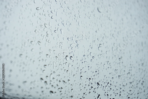 Photos water drops on glass windows background
