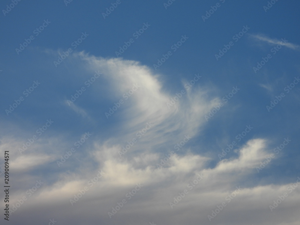 Fototapeta premium The tranquil formations of evening clouds in the sky. Cloudscape in the skies over Assateague Island National Seashore, Worcester County, Maryland.