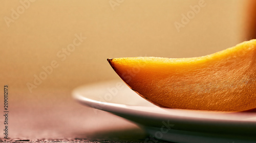 Sliced Orange on White Plate