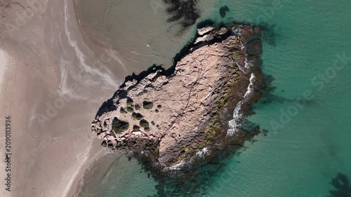 Top Down Drone View of Rocky Coast and Sandy Beach Spain
