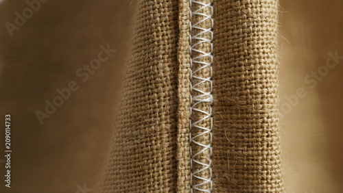 Close-up of brown fabric texture.