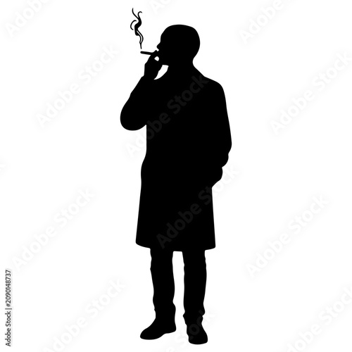 Bild auf Leinwand Silhouette of Man Smoking Cigarette in Profile.