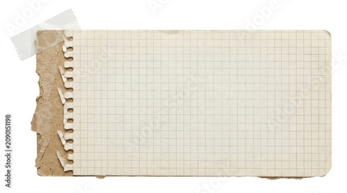 Vintage spiral notebook with torn pages and grid paper.