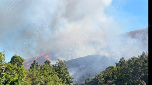 Burning dry grass on the hills of Southern California. 7 july 2026.
