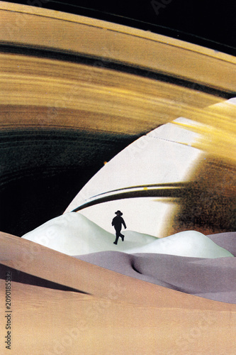 Quadro su tela A young man is running through a complex landscape of snow and desert, with the immense gravitational pull of Saturn in the background