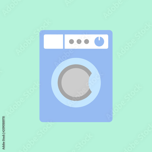 A blue front loading washing machine on a green background