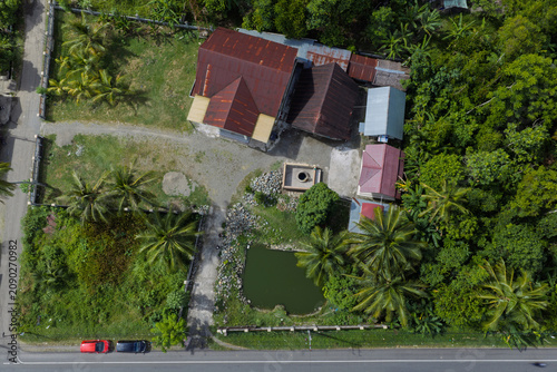 Roadside Housing and Lush Vegetation in Aceh