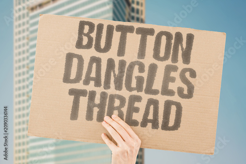 Tableau sur toile "Button Dangles Thread" Shirt closure hangs by single fiber