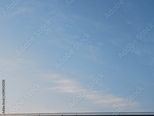 Картината върху платно Evening Clouds and Building Top