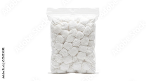 Sterile white cotton balls in clear plastic zipper bag, soft absorbent cotton wool spheres for medical use, hygienic cosmetic fiber pads isolated PNG with Transparent Background