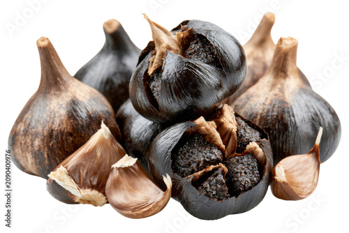 Whole and peeled black garlic isolated as a realistic PNG with rich texture. Ideal for gourmet cooking, healthy eating and culinary concepts.