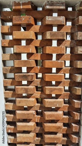 Wooden Slats Fence Covered in Fresh White Snow in Winter Season