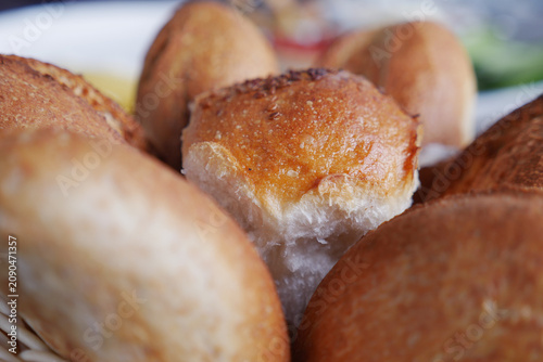 Tablou pe pânză Freshly baked bread rolls await a delicious meal