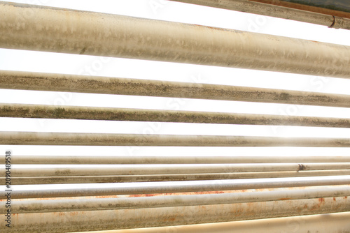 Tableau sur toile stack of steel pipes on rack