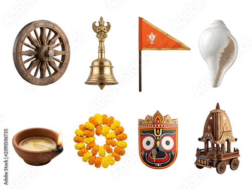 Collection of traditional jagannath temple objects including deities wheel bell and flowers.