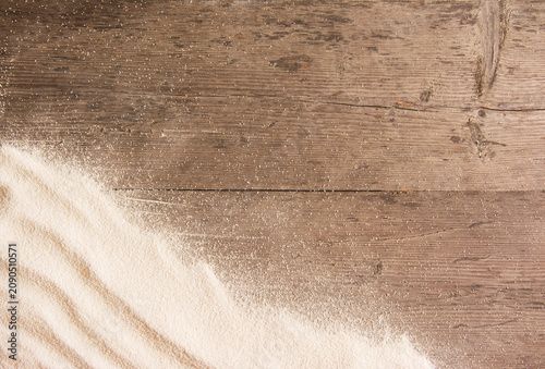 White sand and on planked wood. Summer background with copy space for text. Top view