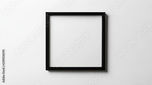 Empty black picture frame on white background.