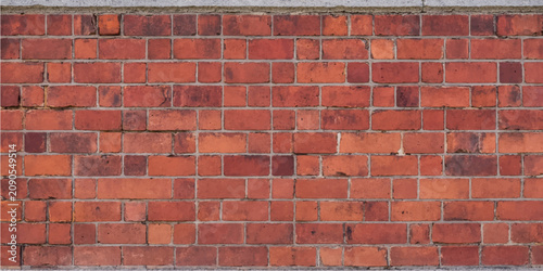 Фотография Red brick wall closeup showing masonry texture with architectural construction d