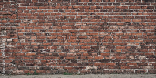 Foto Red brick wall section closeup highlighting masonry texture with architectural c