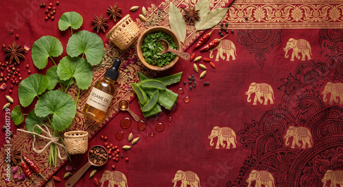 Cinematic top down view of Sri Lankan herbal ingredients on henna fabric