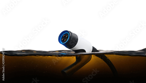 Electric vehicle charger plug partially submerged in water studio shot on white background connector charging car