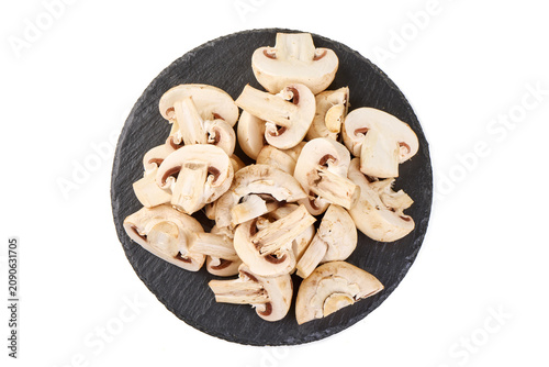Sliced Champignon Mushrooms on a Slate Plate