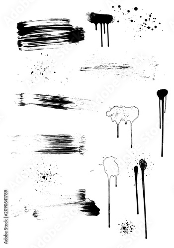 Collection of black ink brush strokes with various grunge paint splatters and hand-drawn drips on a white background, artistic graphic elements