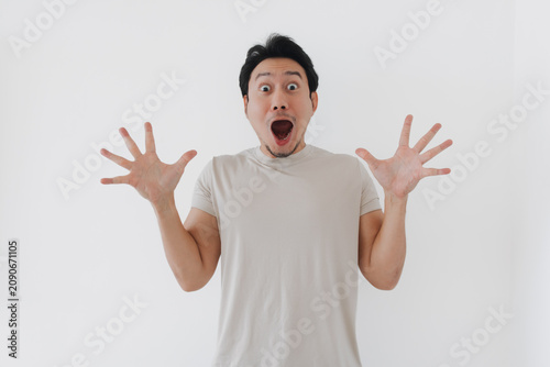 фотографія Surprised Asian Man with Wide Eyes and Open Mouth Expressing Shock and Exaggerated Excitement
