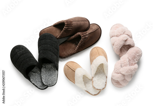 Many soft slippers on white...